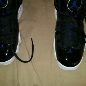 Blue and black jordans